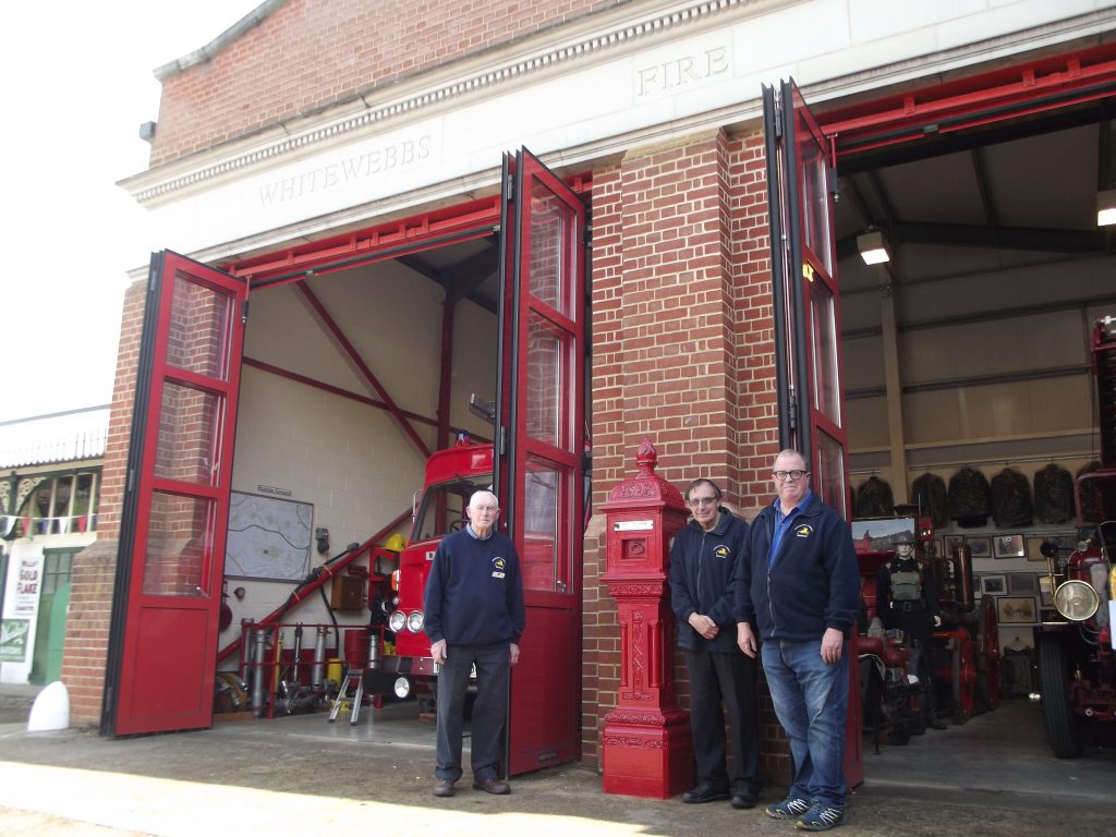 Outside the mock fire station at The Whitewebbs Museum of Transport are Alex Watt, chair of Enfield and District Veteran Vehicle Trust (left), plus trustees Chris Whippe (centre) and Robert Haydock (right)